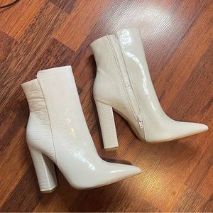 Snakeskin white booties